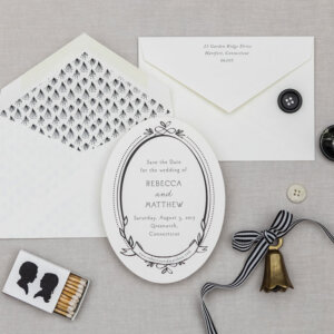 oval card with lined envelope black and white wedding suite