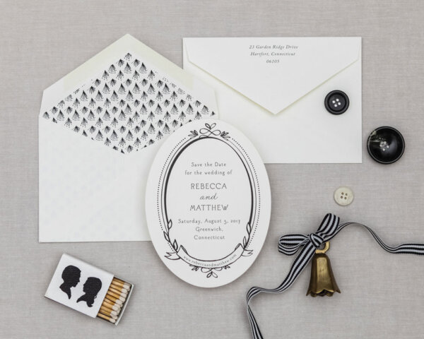 oval card with lined envelope black and white wedding suite