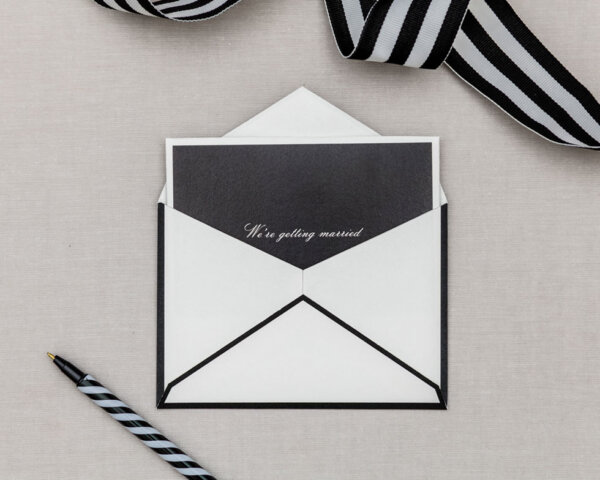 black and white we're getting married envelope